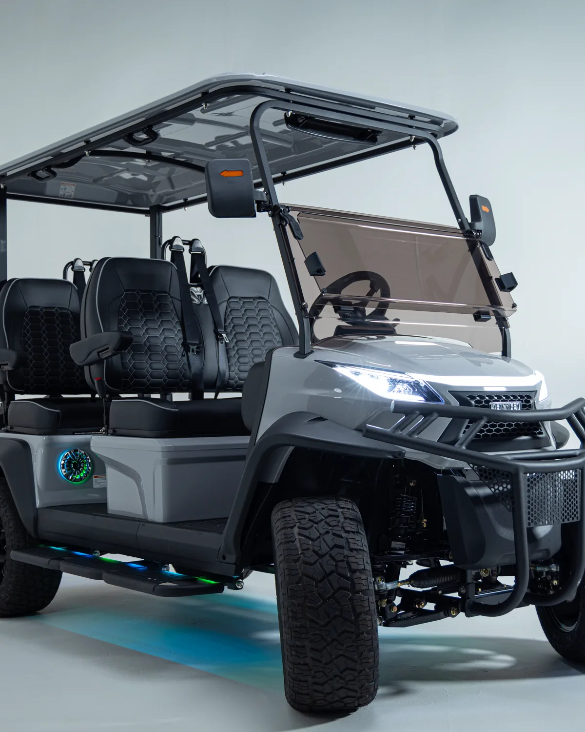 Official Venom EV golf cart, front three-quarter view at the seawall